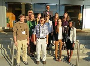 Nine WWU biology undergraduate students with their professors